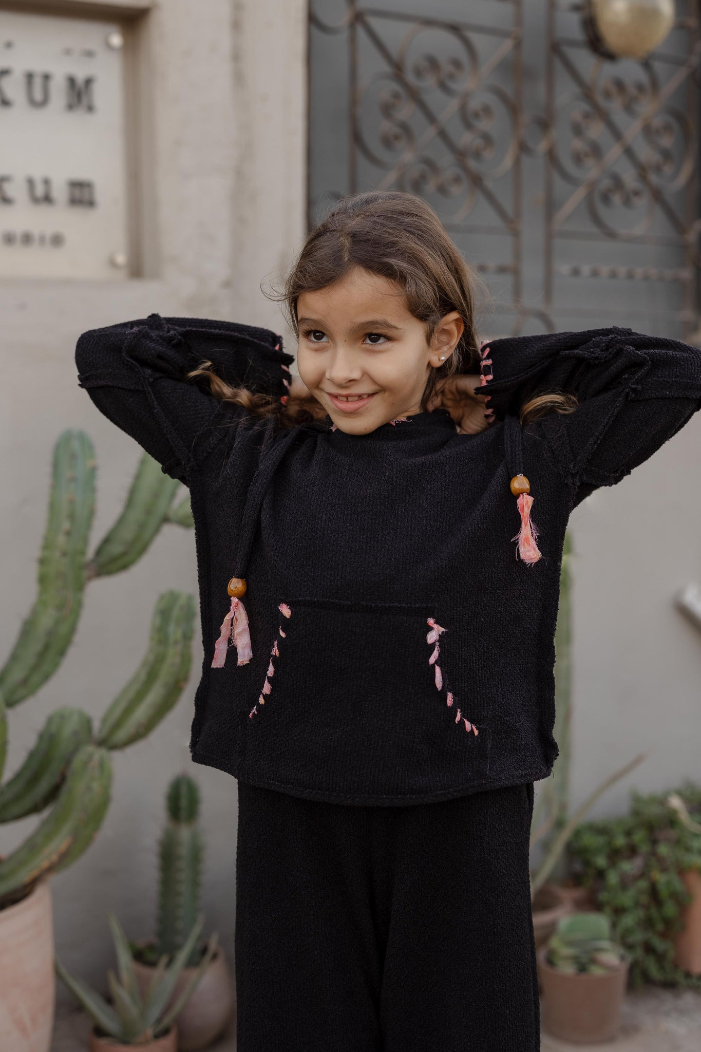 Little Stitched Up Coziness Hoodie in Black