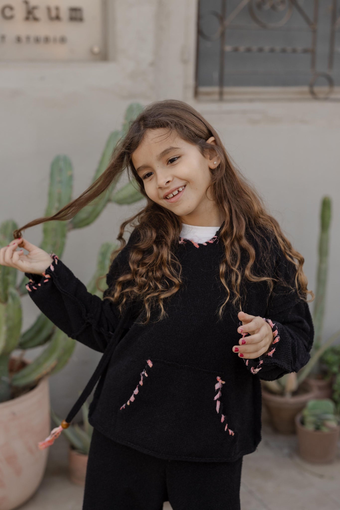 Little Stitched Up Coziness Hoodie in Black