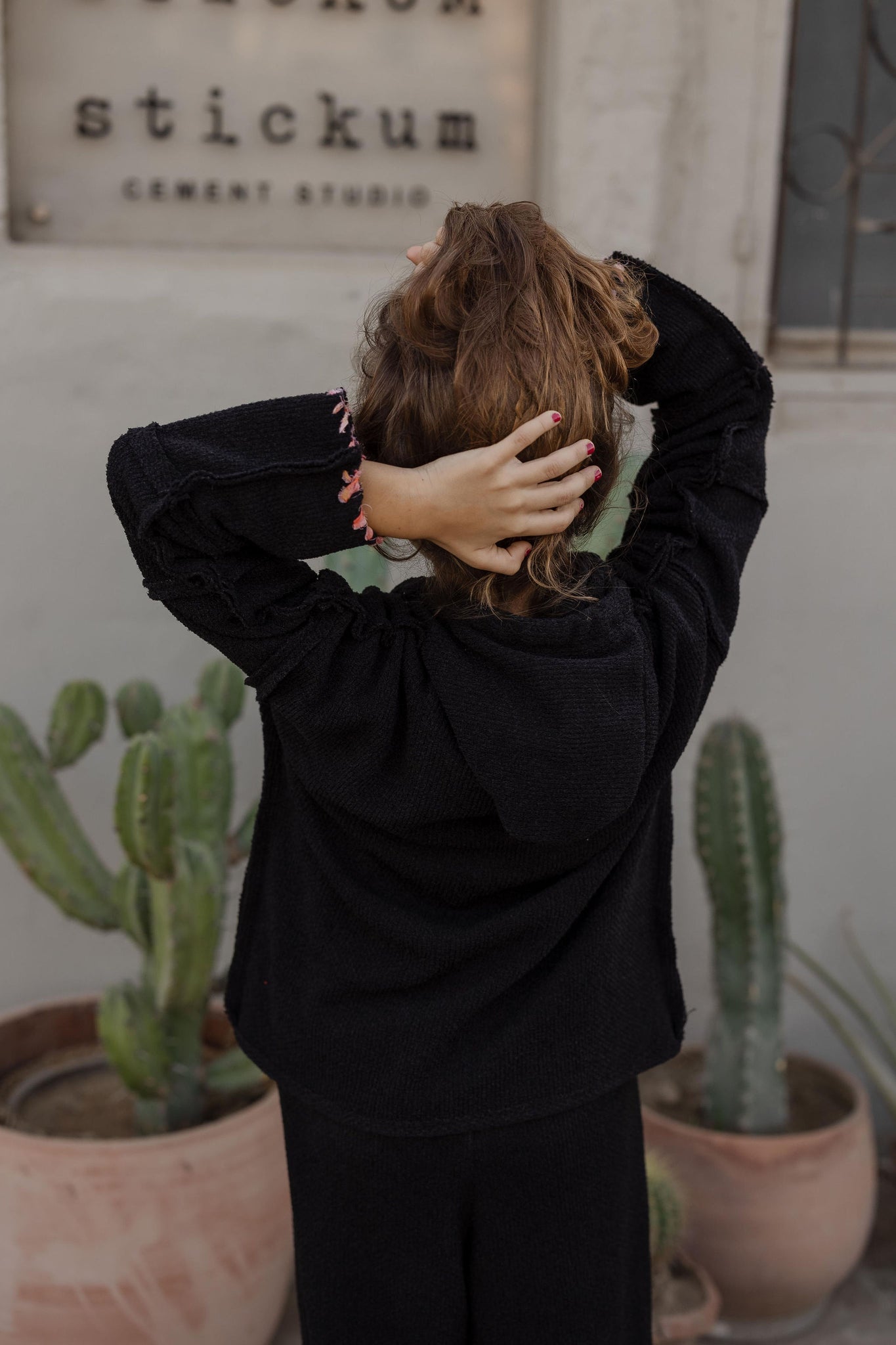 Little Stitched Up Coziness Hoodie in Black