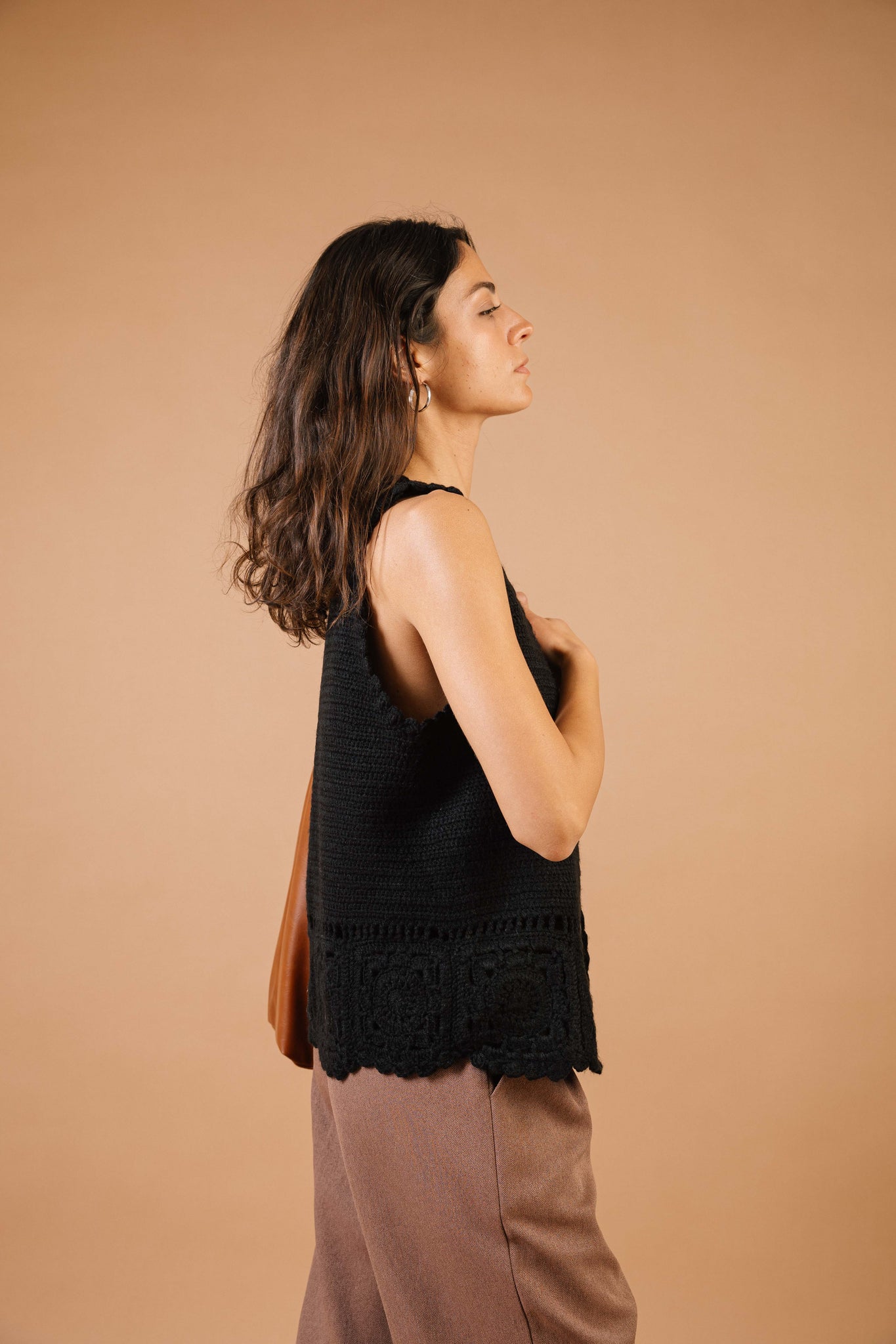The Lady In Black Knitted Vest