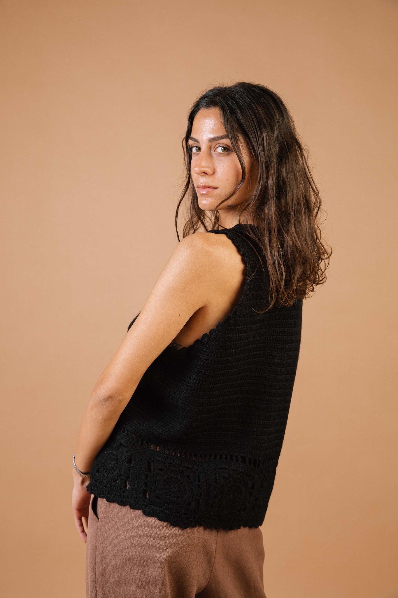 The Lady In Black Knitted Vest