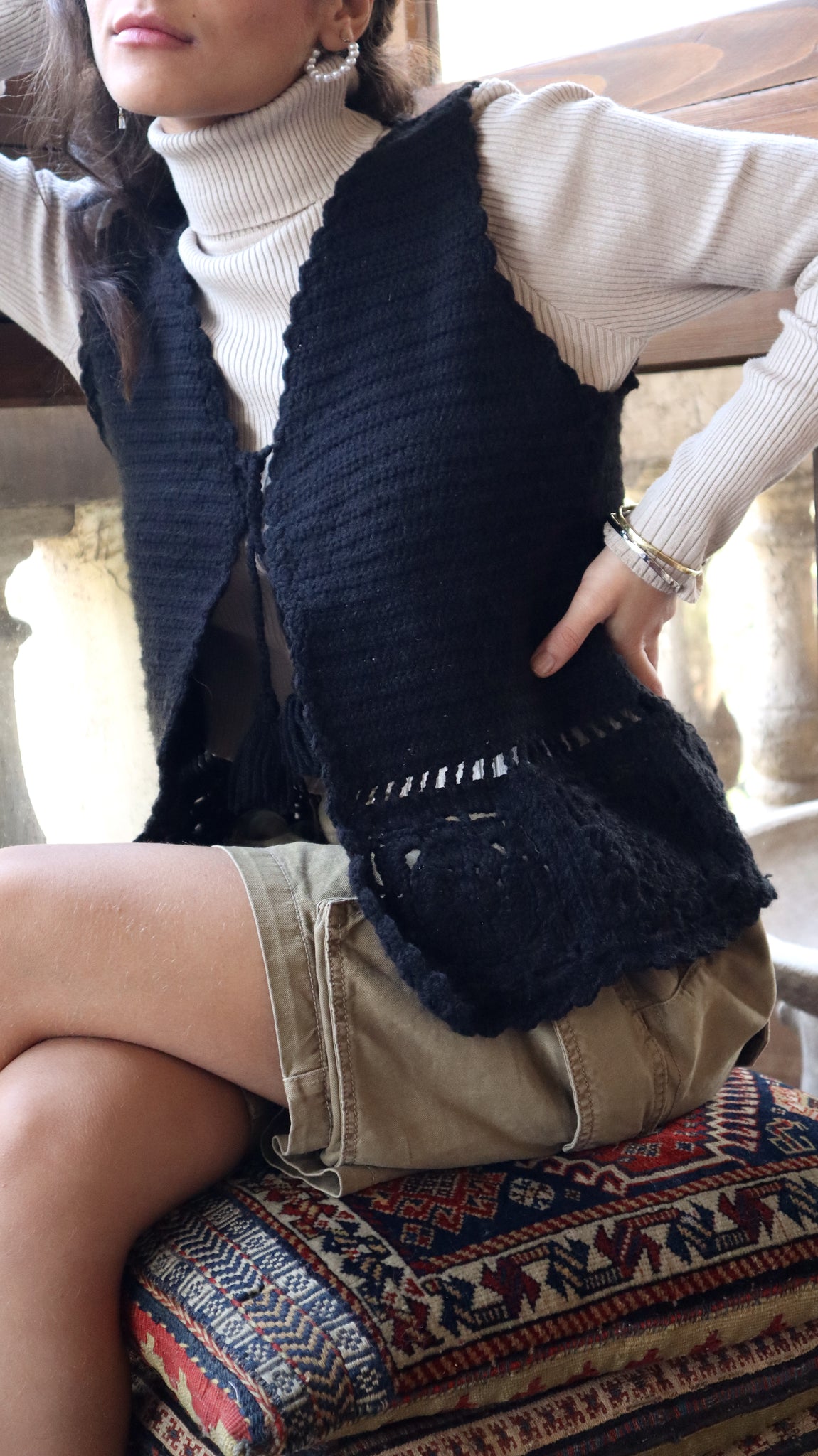 The Lady In Black Knitted Vest